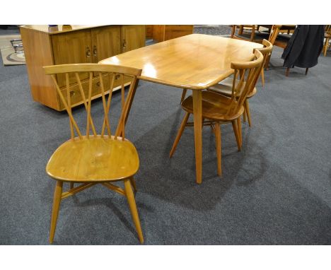 Ercol - Four blonde elm and beech Windsor lattice or 'candlestick' dining chairs, model 376, together with a model 382 dining