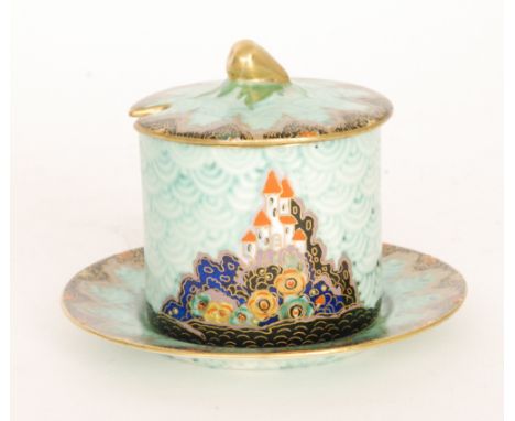 Crown Devon - A 1930s Art Deco drum shaped preserve pot and stand decorated in the Mattajade 'Fairy Castle' pattern with a tu