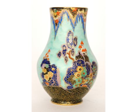 Crown Devon - A 1930s Art Deco vase decorated in the Mattajade 'Fairy Castle' pattern with a turreted castle, stylised traili