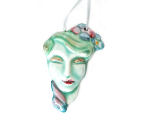 Clarice Cliff - Sadie - A miniature portrait mask/pendant modelled as a fashionable lady with flowers to her hair, picked out
