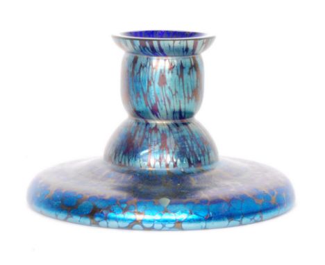 Loetz - An early 20th Century candlestick with wide circular base and domed knop below cylindrical sconce with Cobalt Papillo