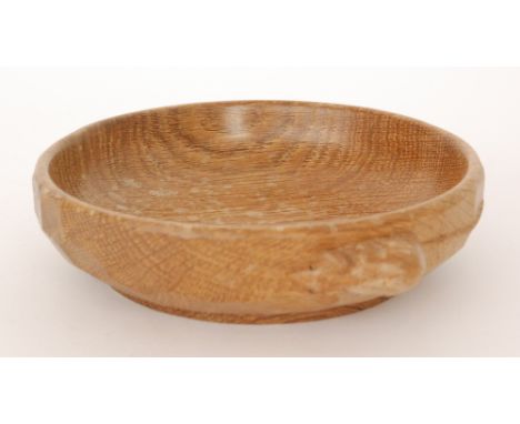 Robert 'Mouseman' Thompson - An oak bowl of circular form, in an adzed finish, with carved 'mouse signature', diameter 15.5cm