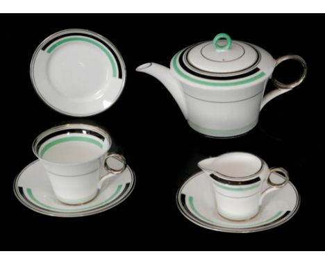 Eric Slater - Shelley - A 1930s Art Deco bone china Regent shape part teaset comprising teapot, one cup and saucer, milk suga