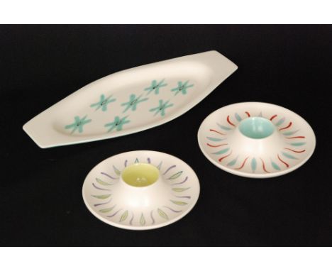 Poole Pottery - Three pieces of 1950s Freeform comprising two shape 104 egg cups decorated in the UFW and UFT pattern and a s