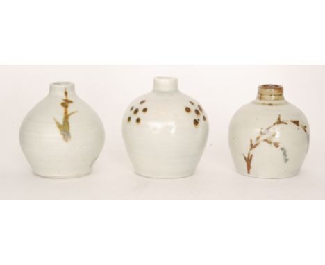 St Ives - Three post war vases each of ovoid form with a squat collar neck, each decorated with brown brush stroke decoration