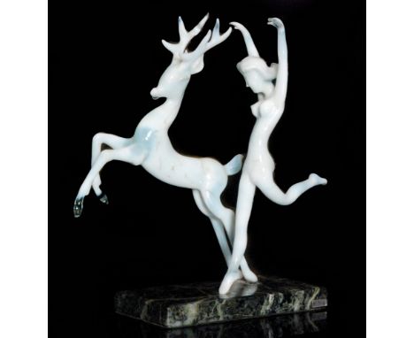 Istvan Komaromy - A figural lamp work group of Diana the Huntress with a leaping stag in tonal white opalescent glass, mounte