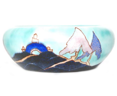 Clarice Cliff - Inspiration Caprice - A shape 55 bowl circa 1930 hand painted with a stylised landscape with trees and a pago