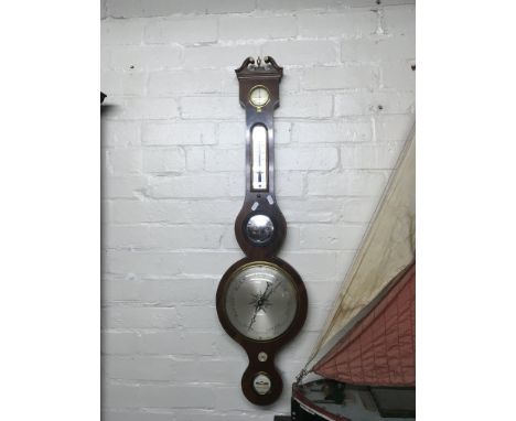 A Georgian mahogany 1860 Weather barometer by J. Cetta Stroudwater.
