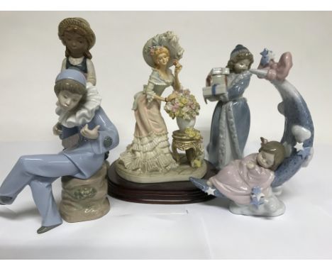 A collection of figures including lladro and Nao (5)