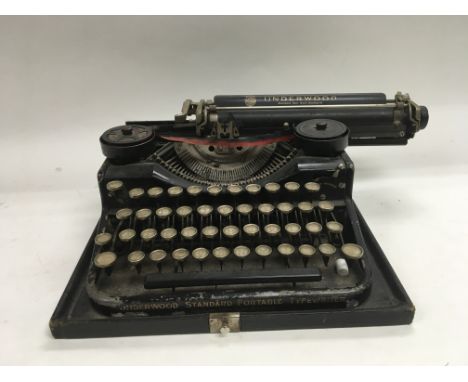 An Underwood portable typewriter with a standard keyboard.