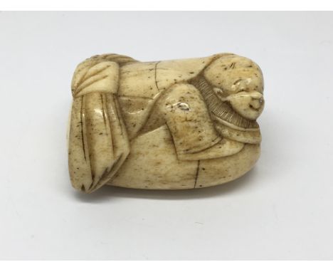 A 19th Century Carved bone Netsuke (AF)