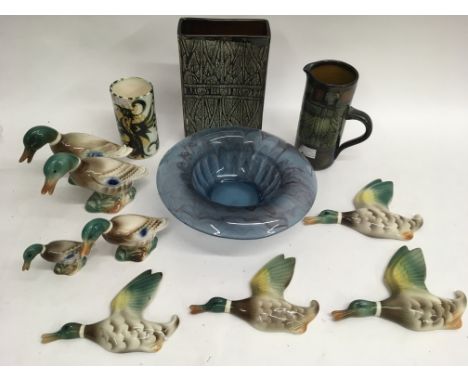 A collection of Keele St.pottery ducks, a Davison glass bowl and Celtic pottery