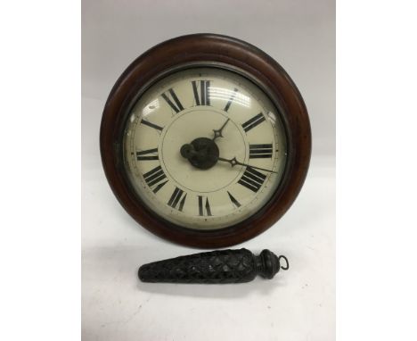 A mahogany cased postman’s alarm clock.