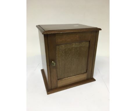 An Edwardian inlaid mahogany smokers cabinet with ceramic mixing bowl inside, approx 25cm x 27cm x 21cm.