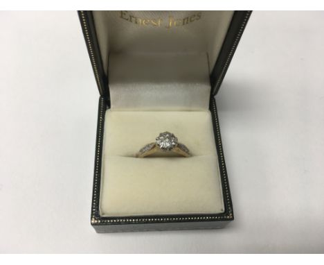 A 9ct yellow gold diamond set fancy ring. Boxed. Size approx M, weight approx 2.6g