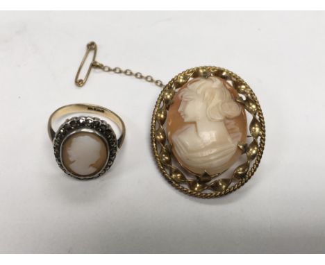 A cameo brooch set in a gold tone frame and a conforming ring size approx J-K.