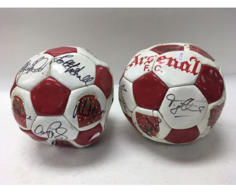 2 signed Arsenal footballs including Tony Adams, Lee Dixon, David Seaman, Luis Boa Morte etc.