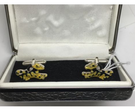 A boxed pair of 925 enamel Disney cufflinks formed as tigers