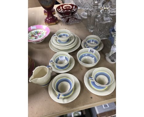 A part susie cooper tea comprising cups saucers and side plates milk jug
