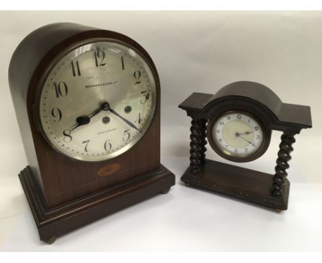 A Boorman & Son Edwardian chiming mantle clock and one other with barley twist supports.