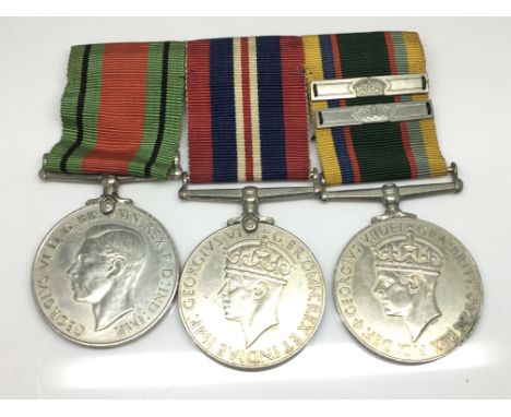 A Cadet Forces Medal with two extra bars presented to Capt.A.A.Fellerman with two WW2 medals