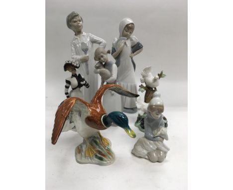 A collection of Lladro and Nao figures, a Beswick duck etc.