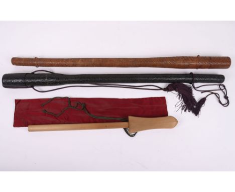 Japanese Arrow Quivers: Two vintage arrow quivers in black and brown finish , longest being the brown at 97 cm long and small
