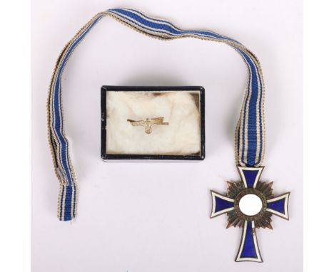Third Reich German Bronze Mothers Cross: Large size enamel medal with neck ribbon, some damage to enamel and metal army eagle