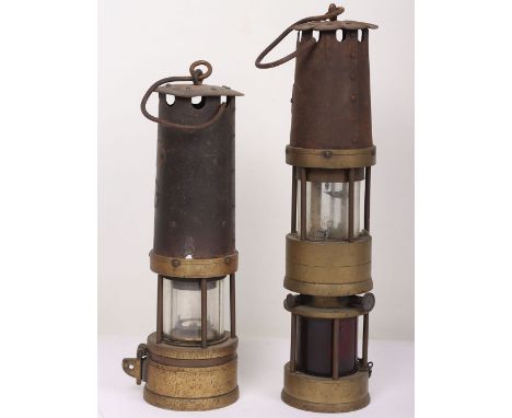 Vintage Miners Lamps: Heavy large miners lamp with makers name plate J.H.NAYLOR to front with clear and red glass and one oth