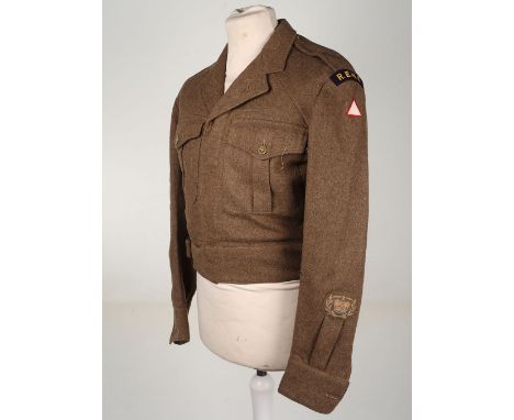 REME Warrant Officers Battle Dress Blouse, 1st Division, REME blouse, with original titles and the post war variant of the 1s