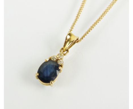 A sapphire and diamond pendant, designed as an oval mixed cut sapphire mounted with three brilliant cut diamonds, all claw se