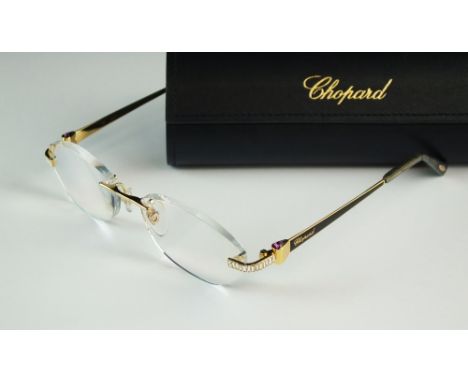 A pair of Chopard gold plated paste set glasses, presented within original case and box 