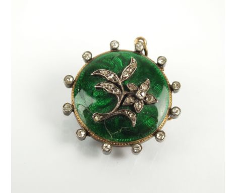 A 19th century green enamel and rose cut diamond pendant brooch, the green engine turned enamel circular pendant set with app