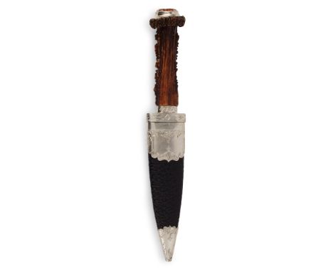 unmarked, the roe deer antler handle with collet set crystal to pommel, the leather covered scabbard with foliate engraved mo