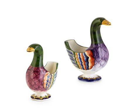 comprising a MEDIUM FLOWER HOLDER, painted and impressed maker's marks WEMYSS, 18.5cm high; and a SMALL FLOWER HOLDER, impres