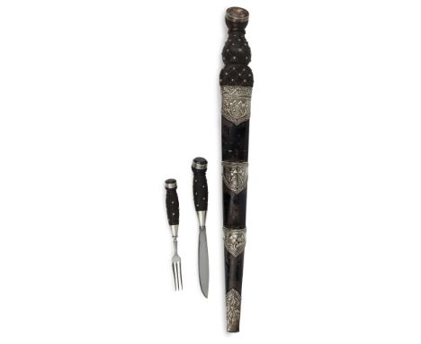 the basket weave ebony handle with silver studs the pommel set with a faceted smokey quartz, a single fuller spear pointed st