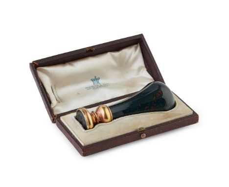 the faceted baluster blood stone handle to a gold collar and mount, the bloodstone matrix intaglio carved with full armorial,