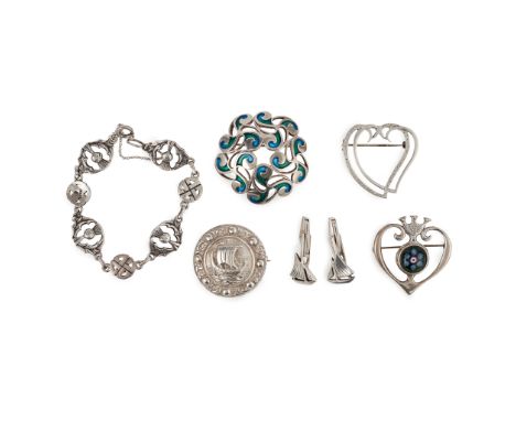 of circular form, nautical depictions; together with a modern silver luckenbooth brooch and another with applied Baccarat sty