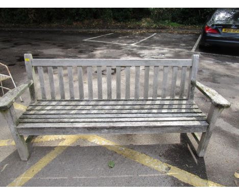 An oak slatted garden bench, 35" x 74" x 24" 