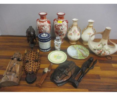 A mixed lot to include Crown Devon vases, a Huntley and Palmer biscuit tin, Japanese vases, a Clarice Cliff plate, African ca