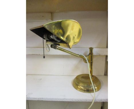 A vintage brass desk lamp 