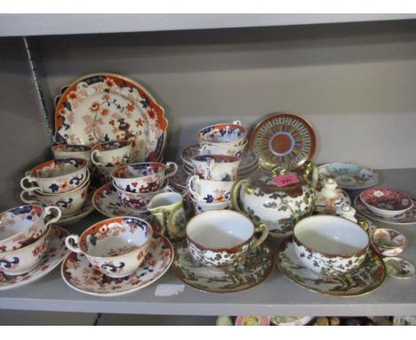 A Noritake sugar bowl with two matching teacups and saucers, and mixed ceramics to include a Japanese style part tea service 