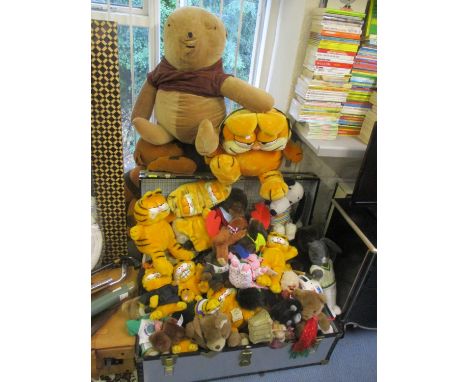 A large selection of soft toys together with a vintage trunk 