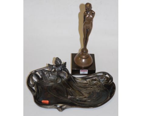 An Art Nouveau style figural pewter pin tray, in the manner of WMF; together with an Art Deco style bronzed figure of a femal