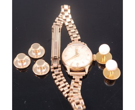 A ladies 9ct gold Omega wristwatch, having manual wind movement, on 9ct gold bracelet, dia. 2cm (excluding crown); together w