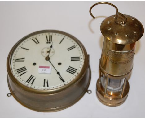 A mid-20th century brass cased ships clock, having painted dial with Roman numerals and subsidiary seconds dial; together wit