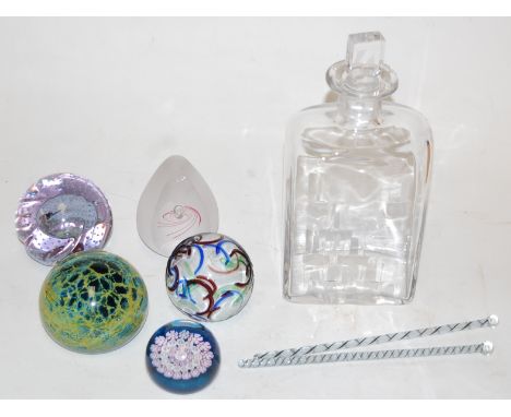 A mid 20th century etched glass decanter and stopper together with various glass paperweights and two airtwist glass swizzle 