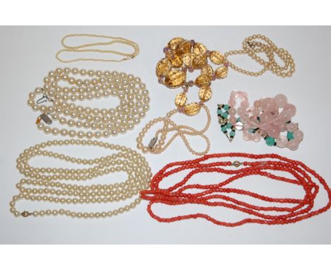 A ladies single string pearl necklace, having 9ct gold clasp; together with various other faux pearl necklaces, coral necklac