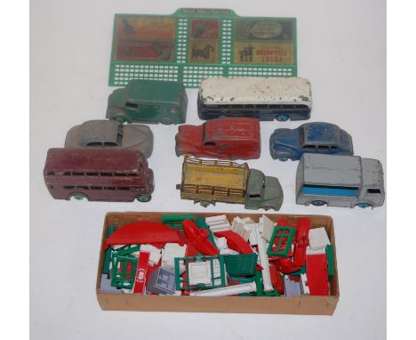 A small collection of playworn diecast toy vehicles to include Dinky Toys Austin Seven, Dinky Toys Trojan, Dinky Toys Dodge, 