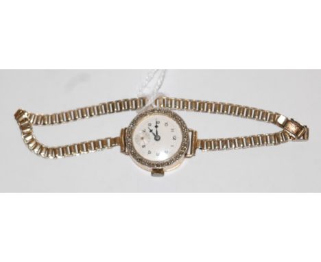A ladies 18ct gold diamond set cocktail watch, having silvered dial with subsidiary seconds dial, within pavé set surround of
